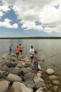 Fishing along the shores of Miller Lake, at Miller's Family Camp