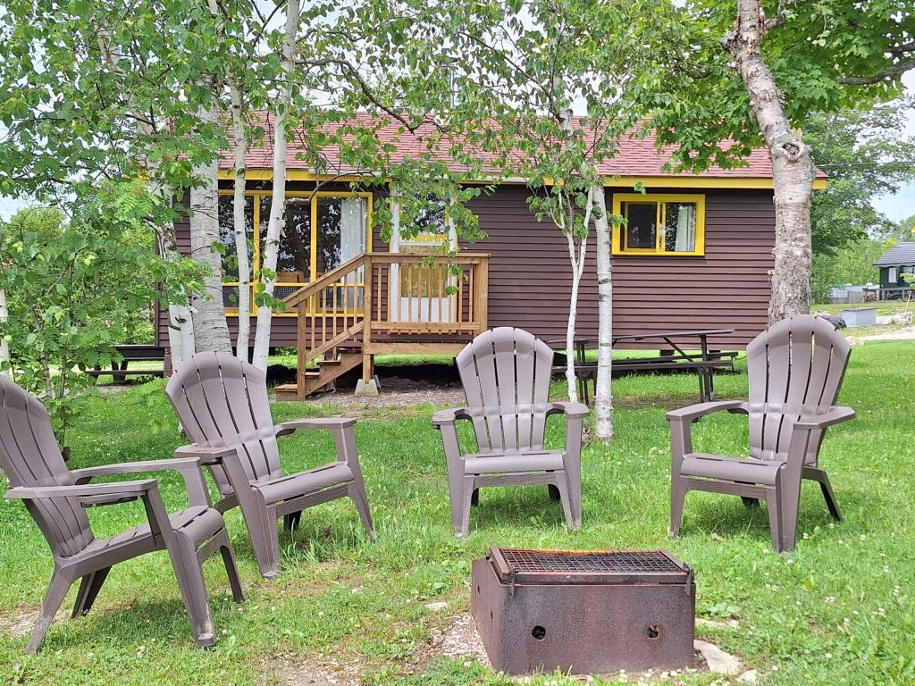 cottage 2 with campfire pit and chairs
